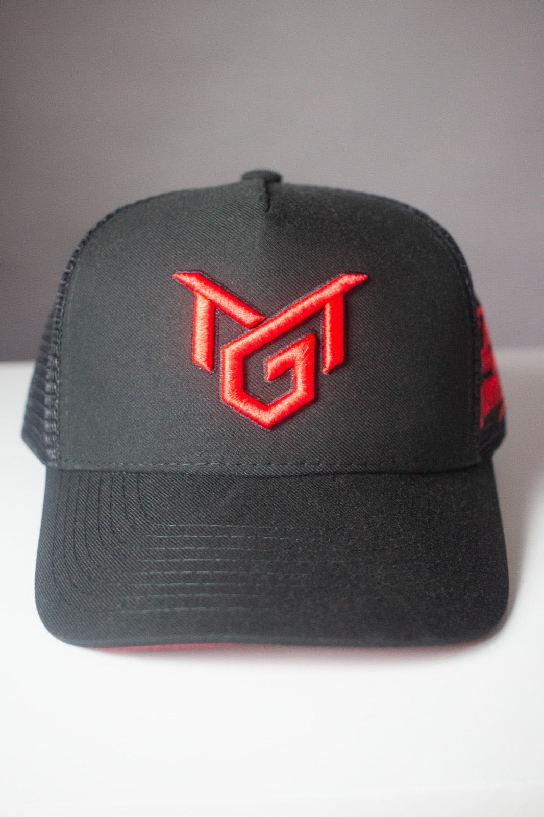 MR.GOAT X OMY TRUCKER HAT (BLACK AND RED)